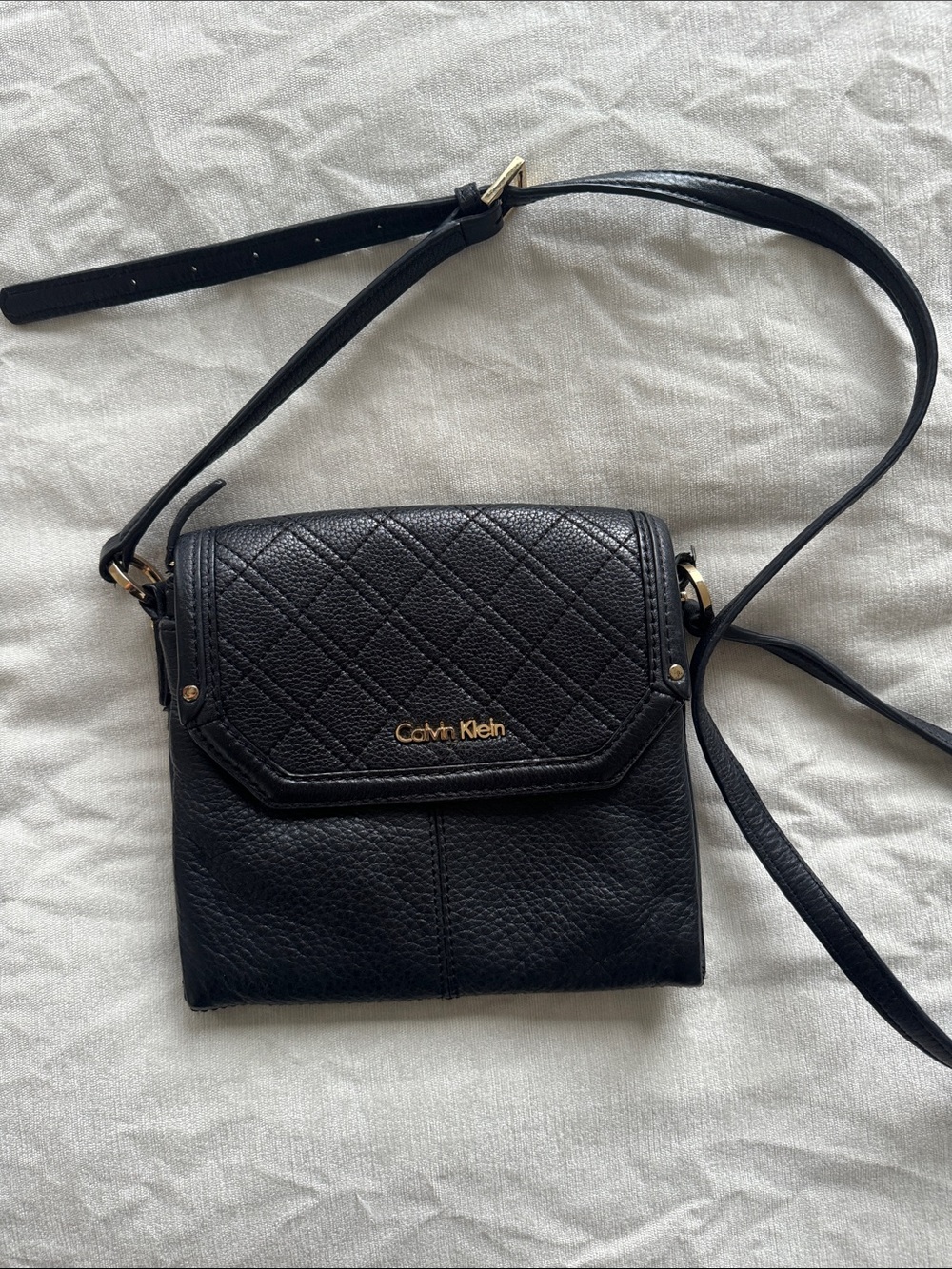 Calvin Klein Black Quilted Flap Crossbody Bag with Gold Hardware